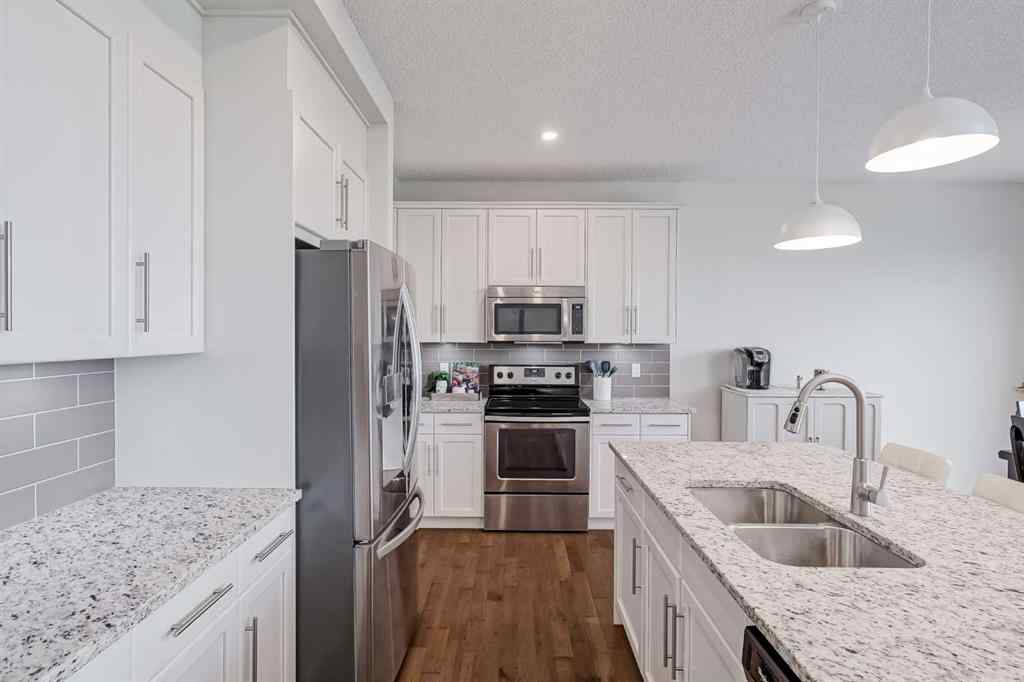 MLS® A2249190 - 225 Kingsmere Cove SE in Kings Heights Airdrie, Residential