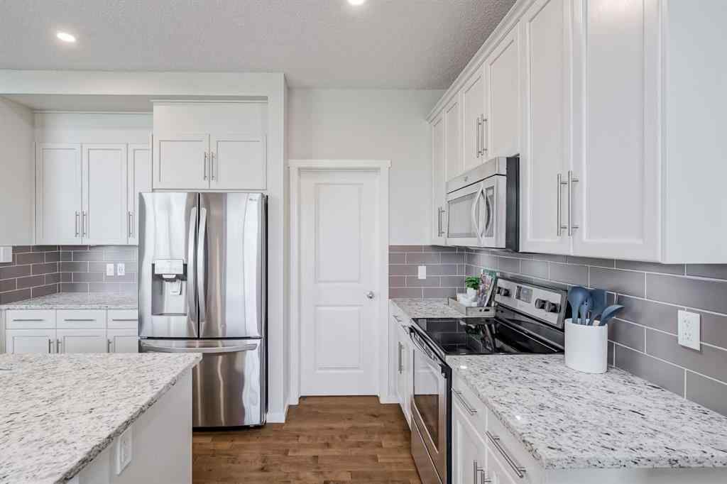 MLS® A2249190 - 225 Kingsmere Cove SE in Kings Heights Airdrie, Residential