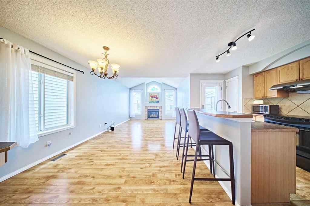 MLS® A2249220 - 145 Tuscany Springs Way NW in Tuscany Calgary, Residential