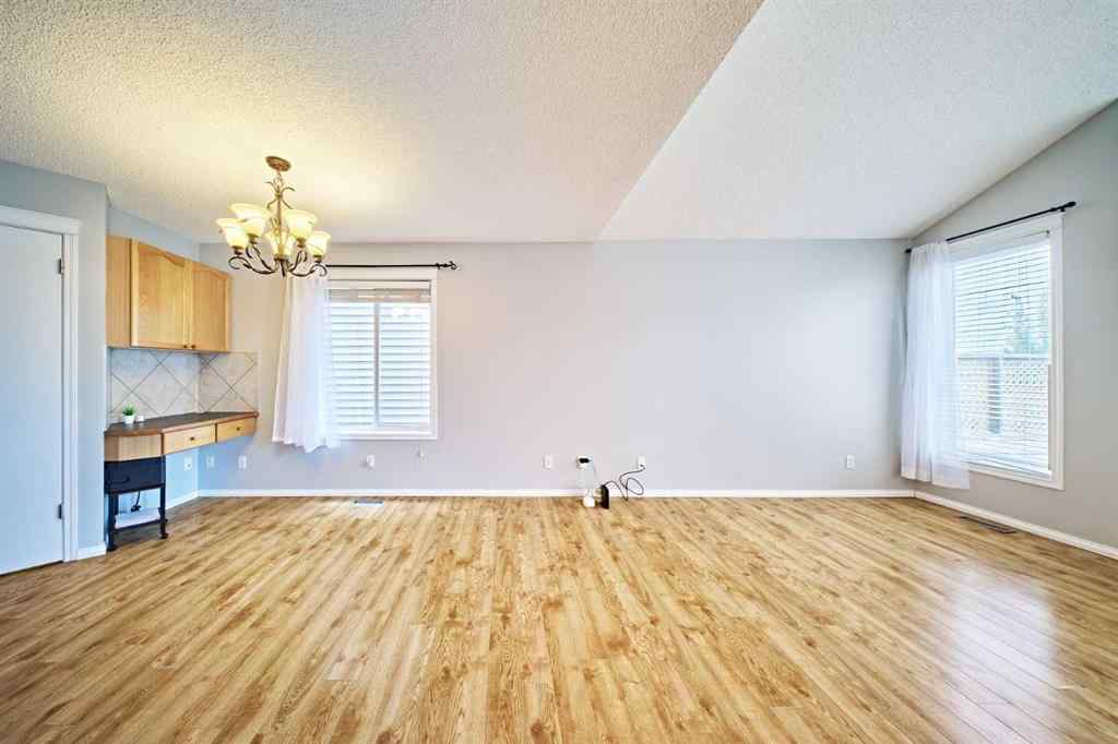 MLS® A2249220 - 145 Tuscany Springs Way NW in Tuscany Calgary, Residential