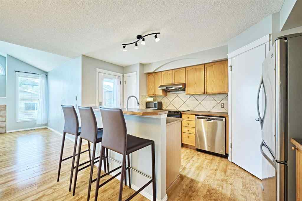 MLS® A2249220 - 145 Tuscany Springs Way NW in Tuscany Calgary, Residential