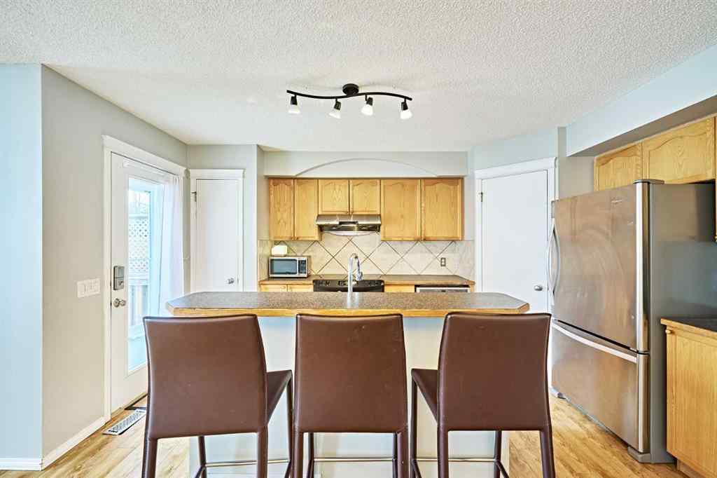 MLS® A2249220 - 145 Tuscany Springs Way NW in Tuscany Calgary, Residential