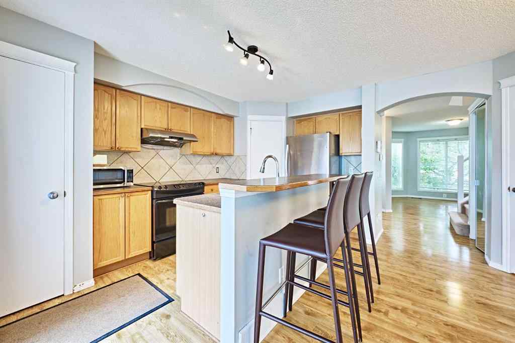 MLS® A2249220 - 145 Tuscany Springs Way NW in Tuscany Calgary, Residential