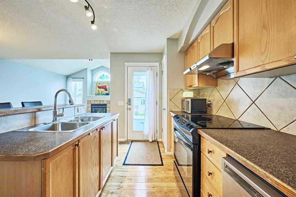 MLS® A2249220 - 145 Tuscany Springs Way NW in Tuscany Calgary, Residential