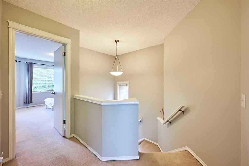 MLS® A2249220 - 145 Tuscany Springs Way NW in Tuscany Calgary, Residential