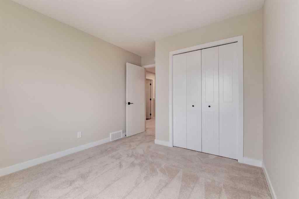 MLS® A2249254 - 104 Heartwood Lane SE in Rangeview Calgary, Residential