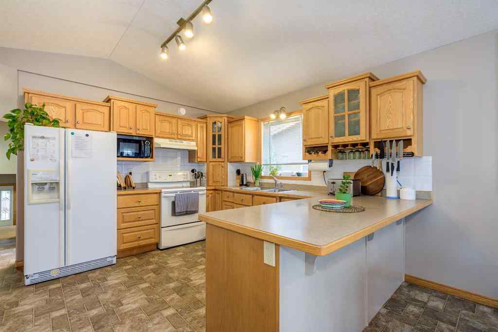 MLS® A2249261 - 87 Lampard Crescent  in Lancaster Green Red Deer, Residential