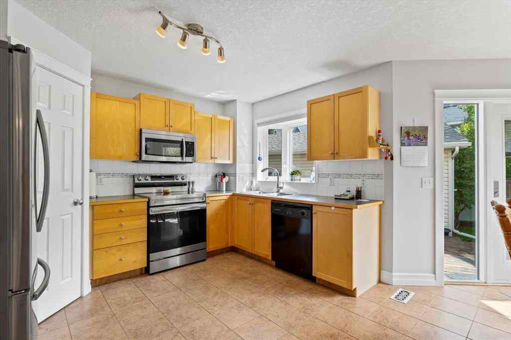 MLS® A2249264 - 140 Eversyde Circle SW in Evergreen Calgary, Residential