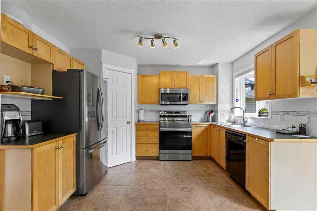 MLS® A2249264 - 140 Eversyde Circle SW in Evergreen Calgary, Residential