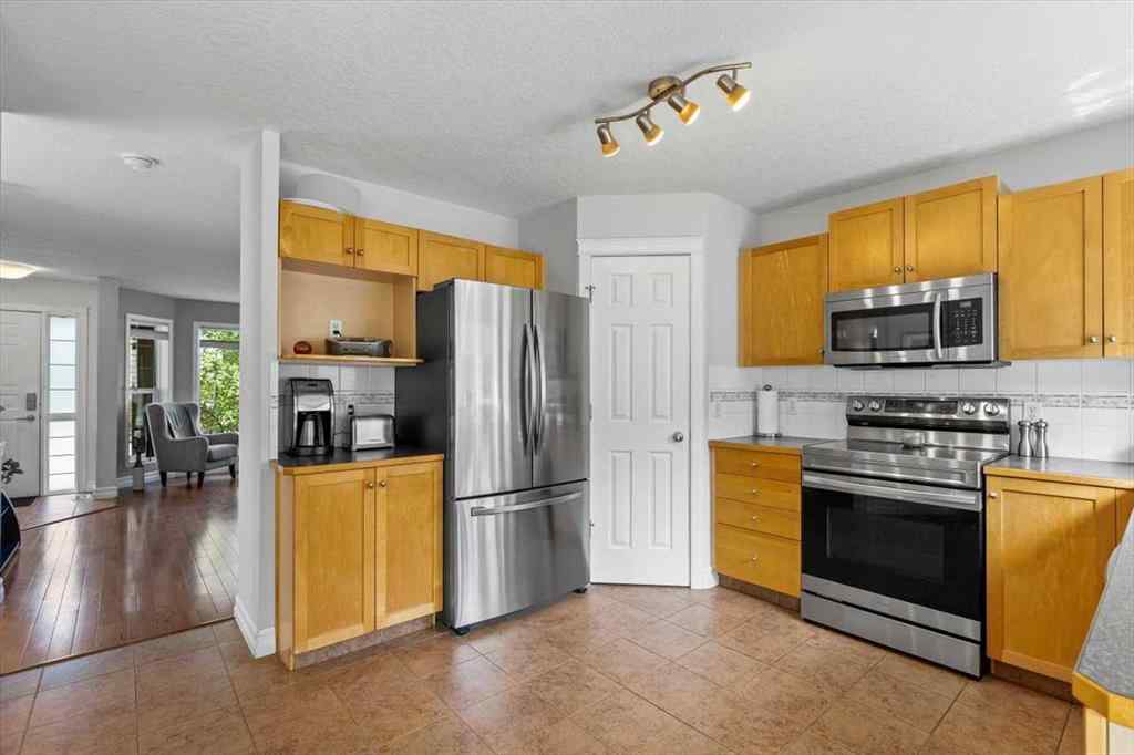 MLS® A2249264 - 140 Eversyde Circle SW in Evergreen Calgary, Residential