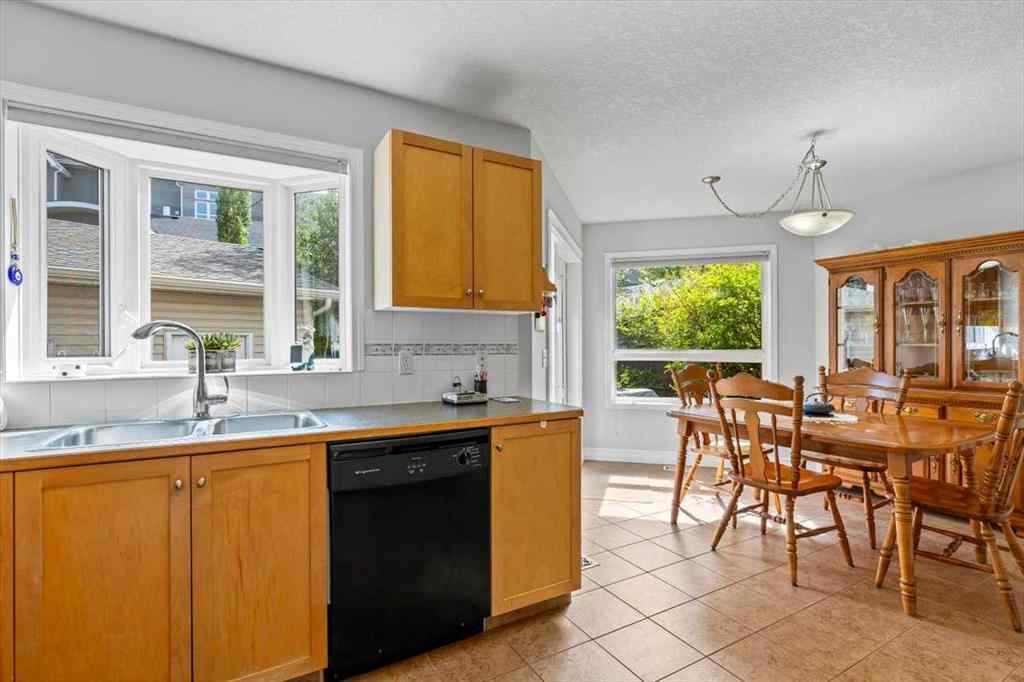 MLS® A2249264 - 140 Eversyde Circle SW in Evergreen Calgary, Residential