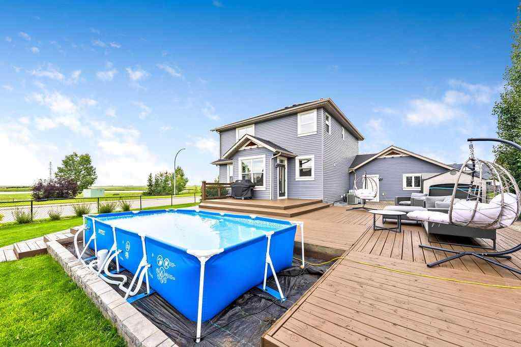 MLS® A2249266 - 703 Boulder Creek Drive SE in Boulder Creek Estates Langdon, Residential