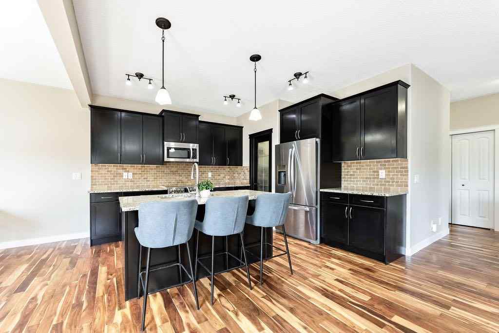 MLS® A2249287 - 1363 Kings Heights Road SE in Kings Heights Airdrie, Residential