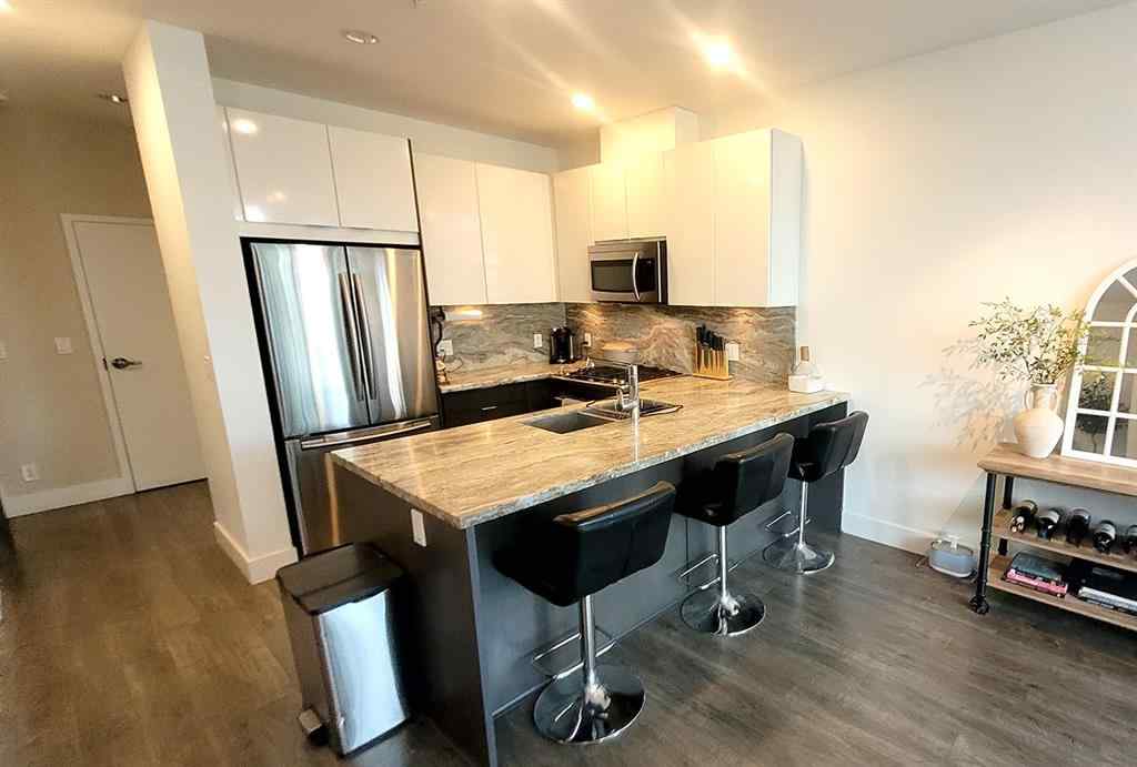 MLS® A2249292 - 111 Confluence Mews SE in Downtown East Village Calgary, Residential
