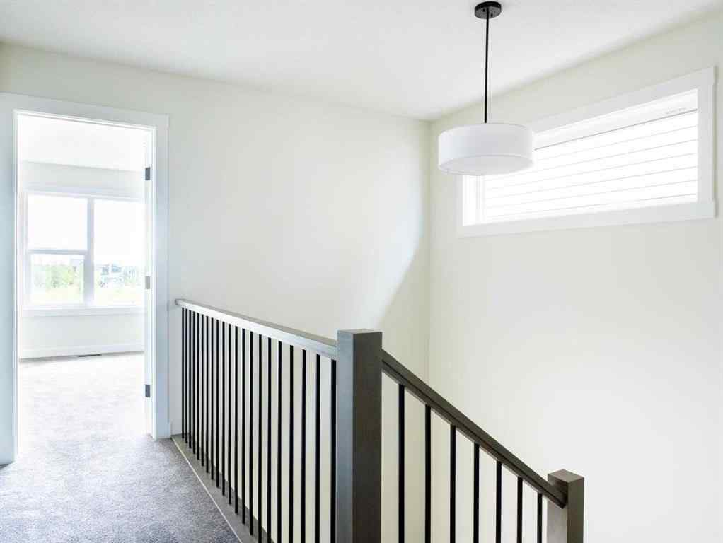 MLS® A2249304 - 143 Creekstone Circle SW in Pine Creek Calgary, Residential