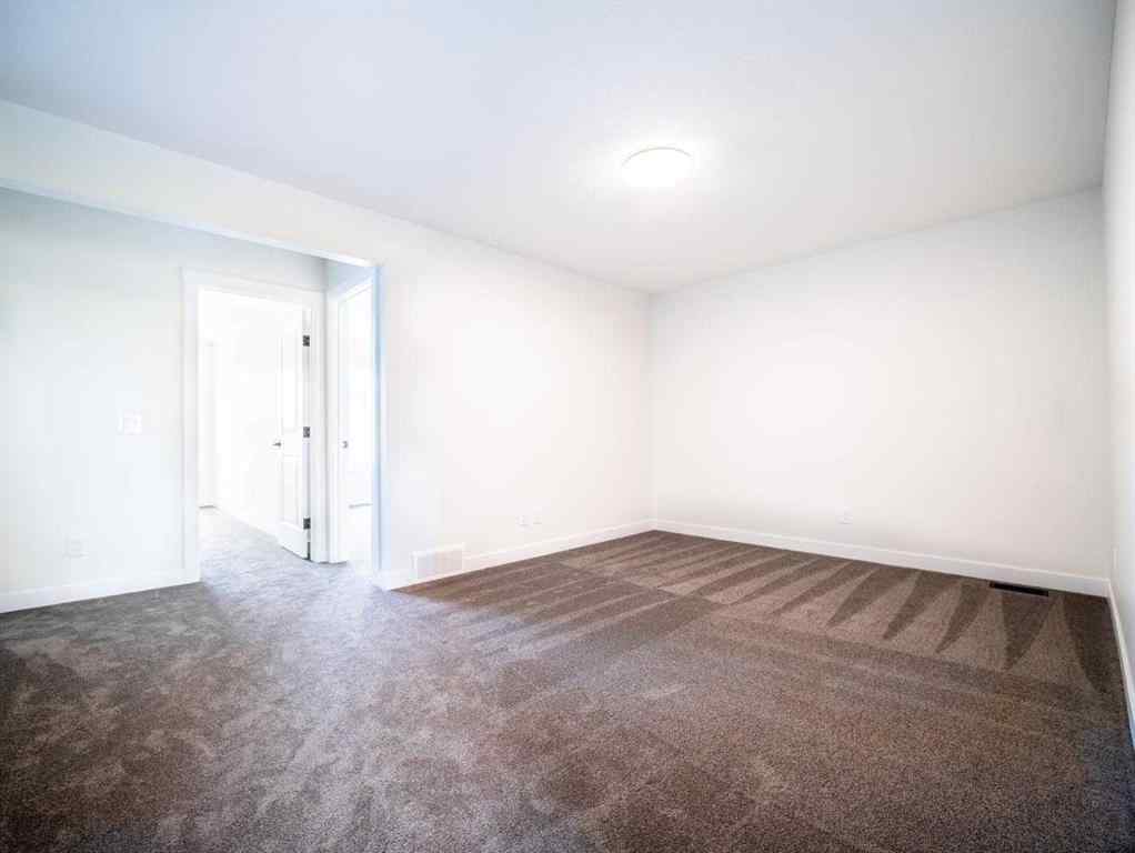 MLS® A2249304 - 143 Creekstone Circle SW in Pine Creek Calgary, Residential