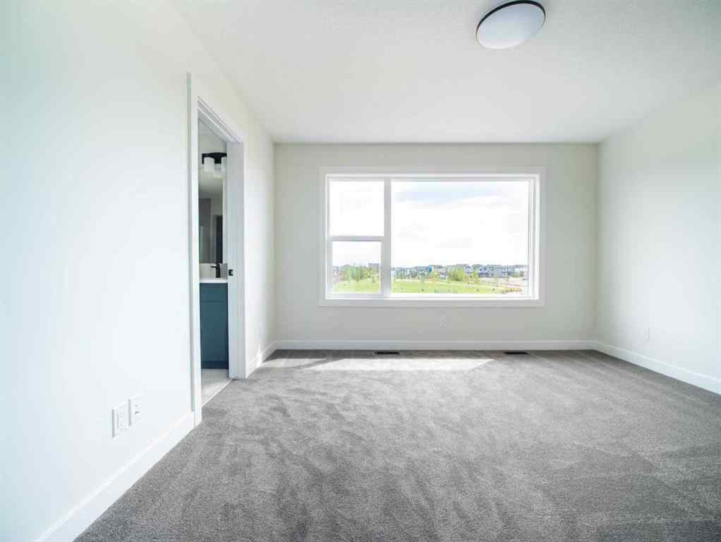 MLS® A2249304 - 143 Creekstone Circle SW in Pine Creek Calgary, Residential