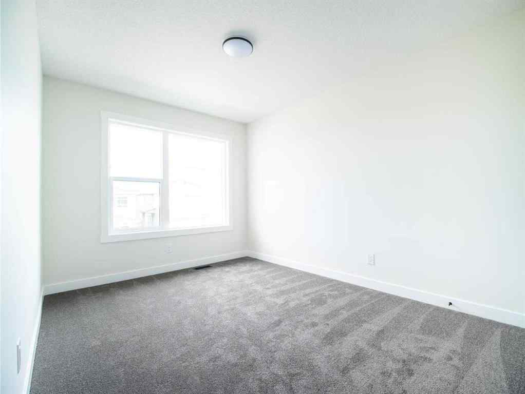 MLS® A2249304 - 143 Creekstone Circle SW in Pine Creek Calgary, Residential