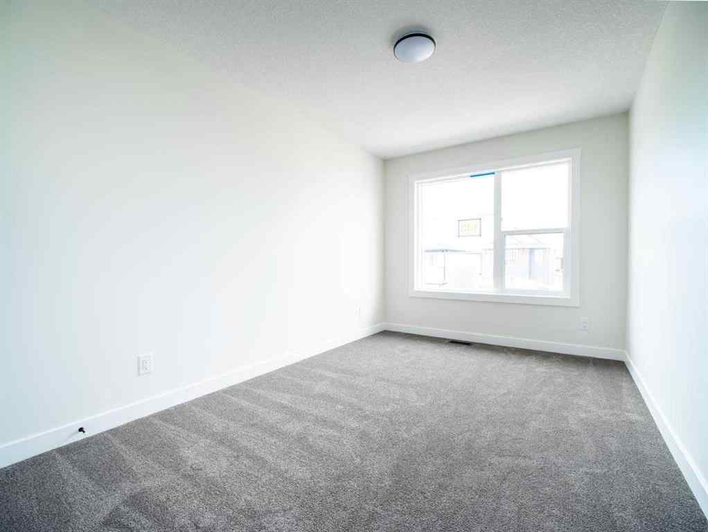 MLS® A2249304 - 143 Creekstone Circle SW in Pine Creek Calgary, Residential