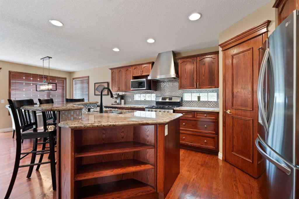 MLS® A2249308 - 182 Sienna Park Drive SW in Signal Hill Calgary, Residential