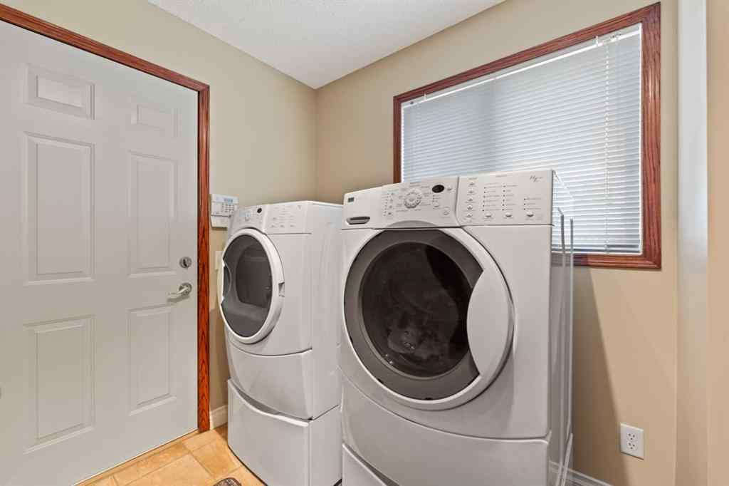 MLS® A2249308 - 182 Sienna Park Drive SW in Signal Hill Calgary, Residential