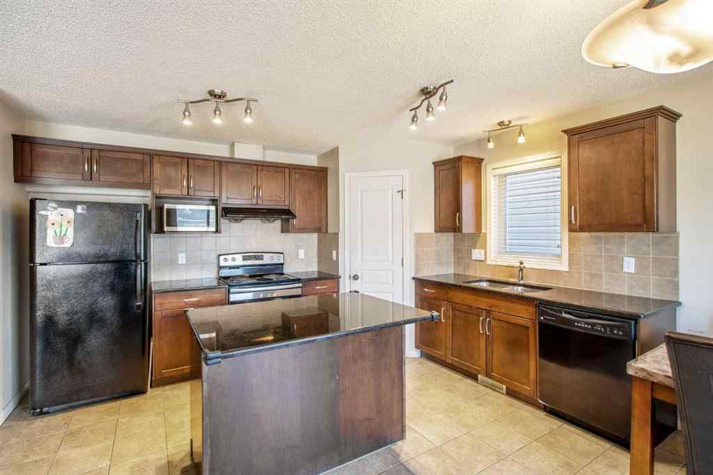MLS® A2249344 - 15 Kingsland Way SE in Kings Heights Airdrie, Residential