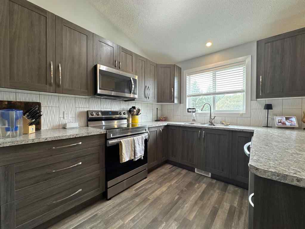 MLS® A2249364 - 12 Rutherford Drive  in Rosedale Estates Red Deer, Residential