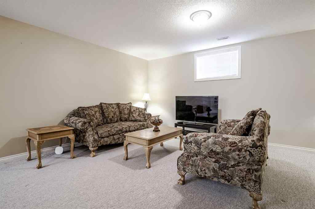 MLS® A2249378 - 99 Tucker Circle  in Westmount_OK Okotoks, Residential