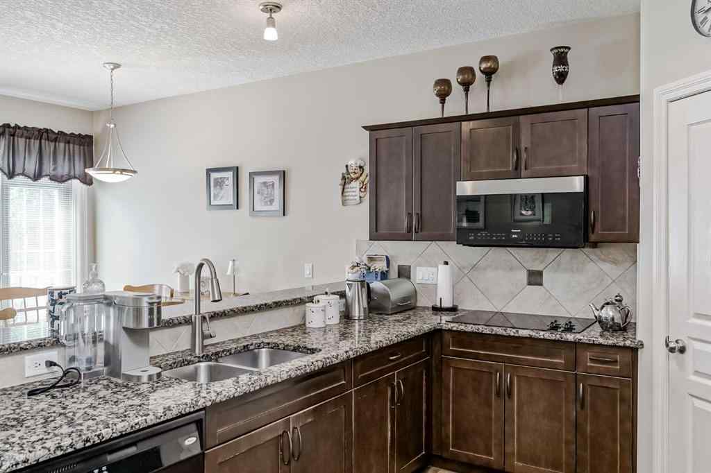 MLS® A2249378 - 99 Tucker Circle  in Westmount_OK Okotoks, Residential