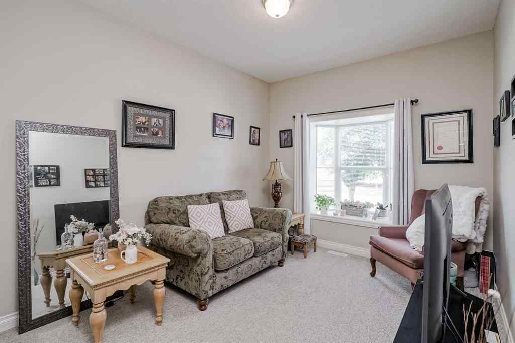 MLS® A2249378 - 99 Tucker Circle  in Westmount_OK Okotoks, Residential
