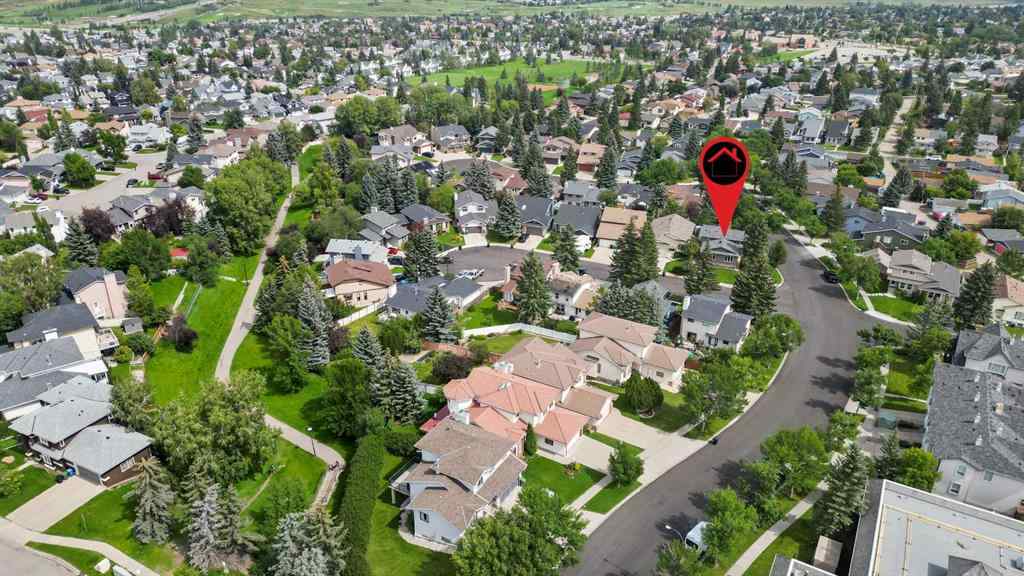 MLS® A2249395 - 103 Sandarac Place NW in Sandstone Valley Calgary, Residential