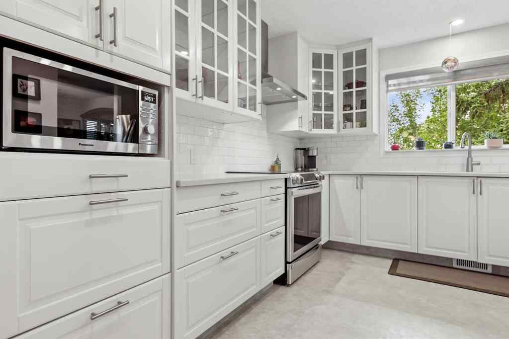 MLS® A2249395 - 103 Sandarac Place NW in Sandstone Valley Calgary, Residential
