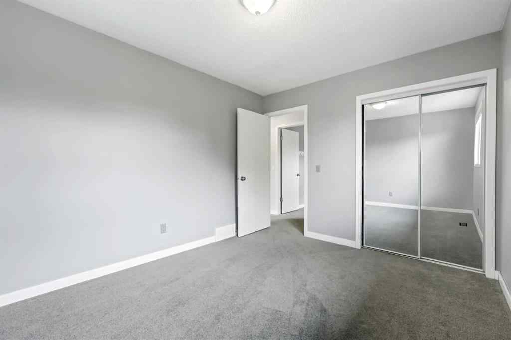 MLS® A2249395 - 103 Sandarac Place NW in Sandstone Valley Calgary, Residential