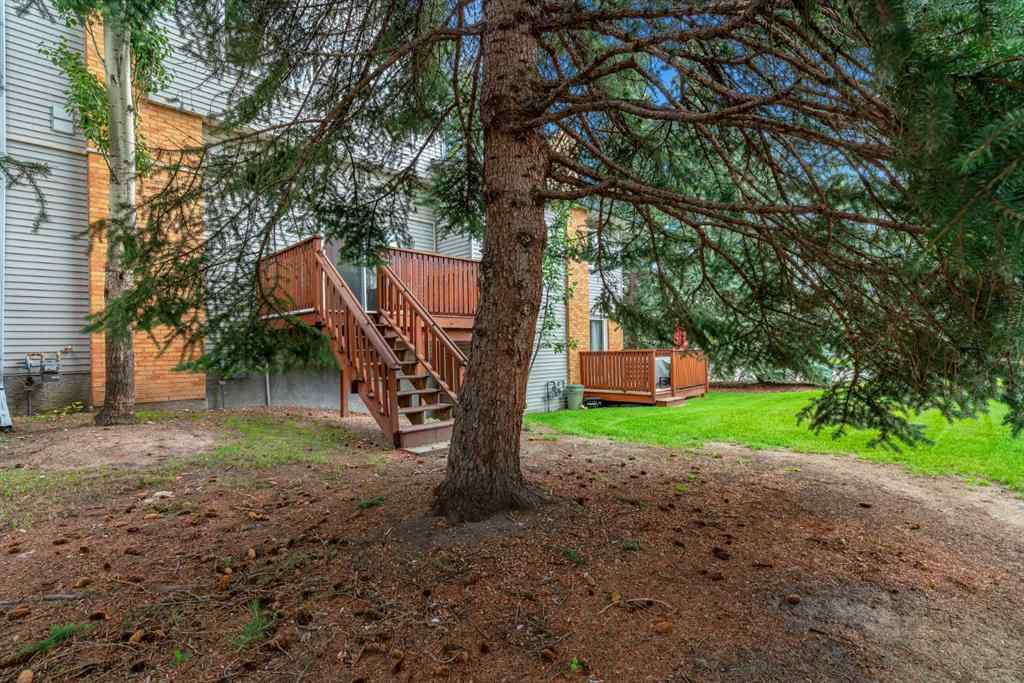 MLS® A2249410 - 22 Coachway Green SW in Coach Hill Calgary, Residential