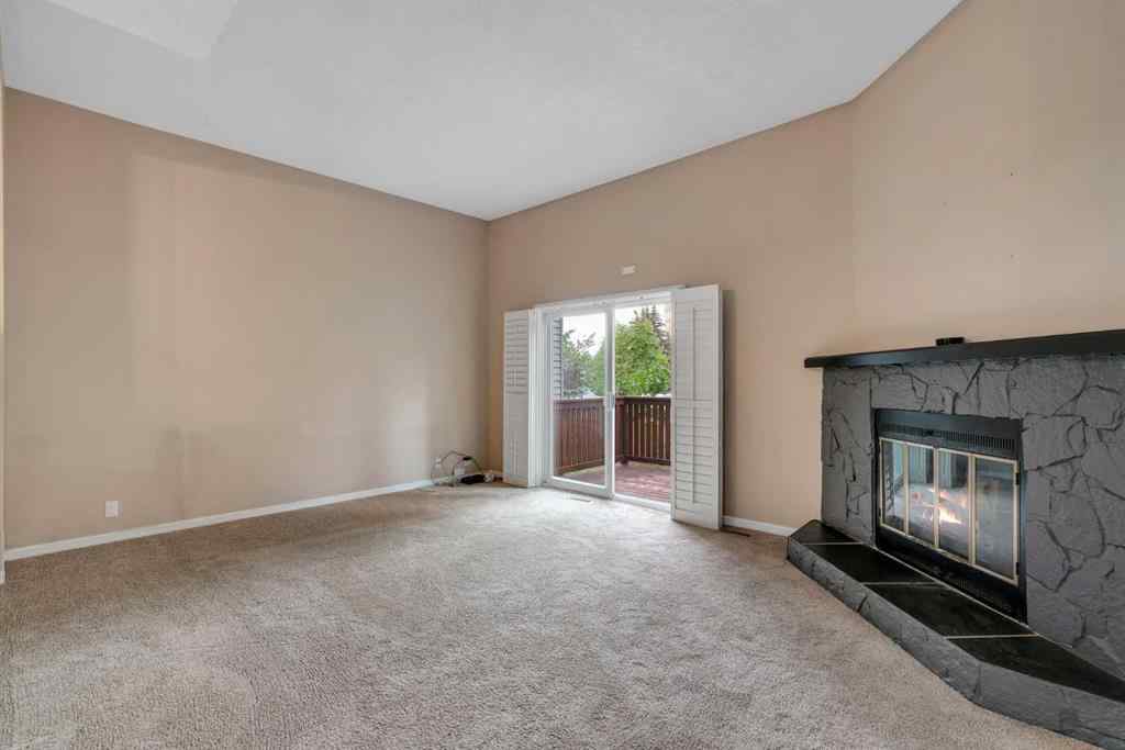 MLS® A2249410 - 22 Coachway Green SW in Coach Hill Calgary, Residential