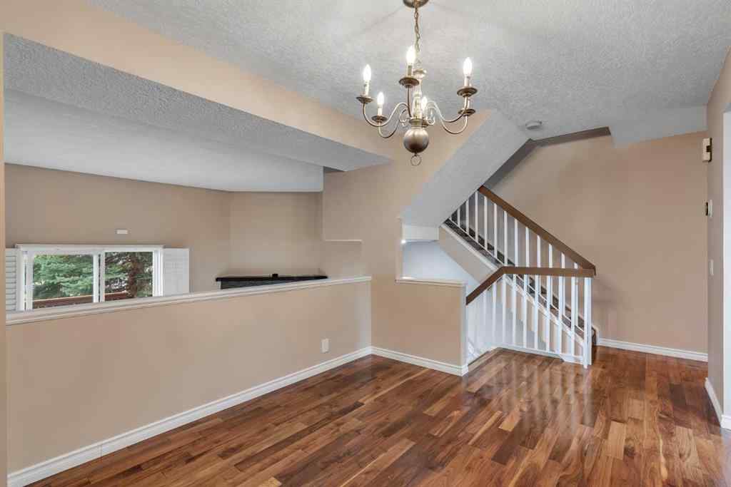 MLS® A2249410 - 22 Coachway Green SW in Coach Hill Calgary, Residential