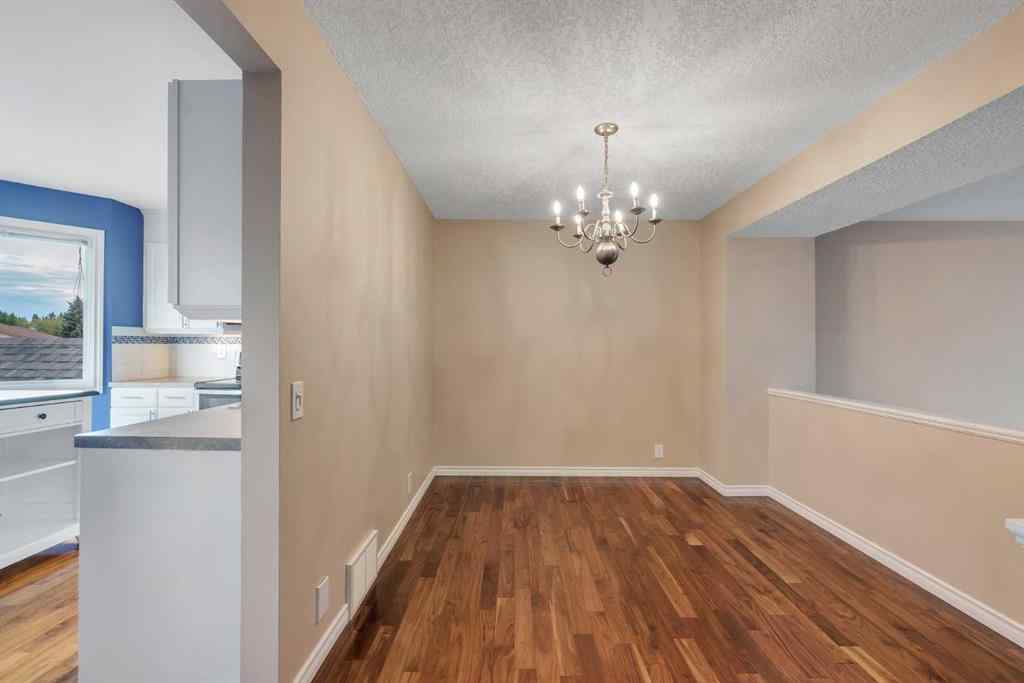 MLS® A2249410 - 22 Coachway Green SW in Coach Hill Calgary, Residential