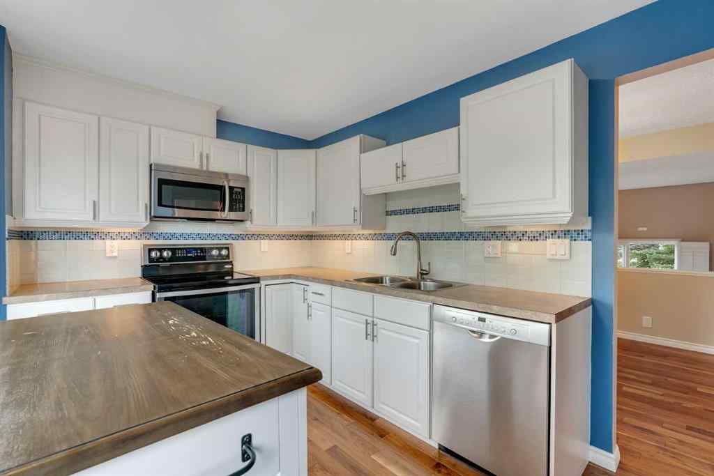 MLS® A2249410 - 22 Coachway Green SW in Coach Hill Calgary, Residential