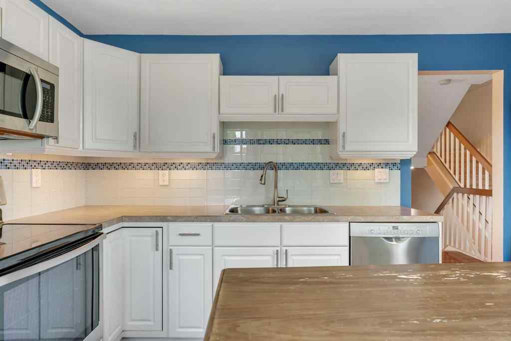 MLS® A2249410 - 22 Coachway Green SW in Coach Hill Calgary, Residential