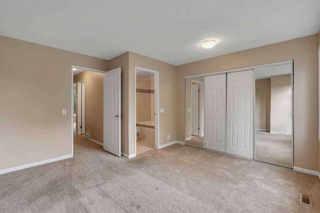 MLS® A2249410 - 22 Coachway Green SW in Coach Hill Calgary, Residential