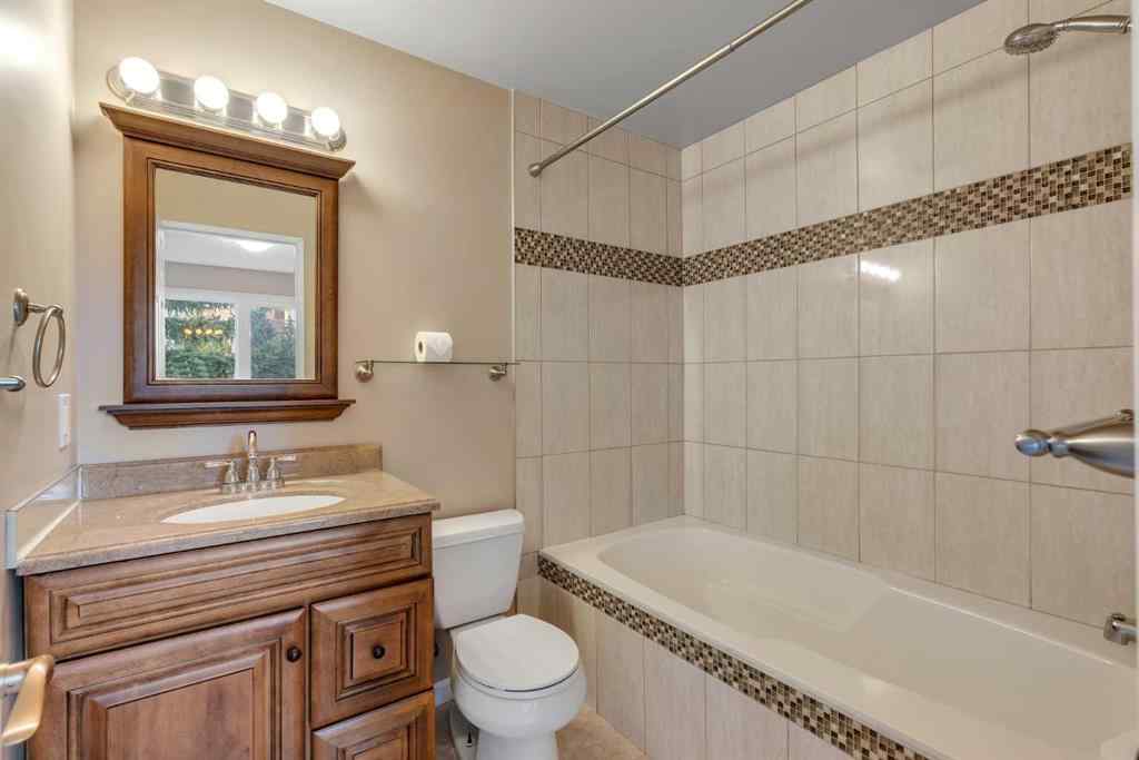 MLS® A2249410 - 22 Coachway Green SW in Coach Hill Calgary, Residential