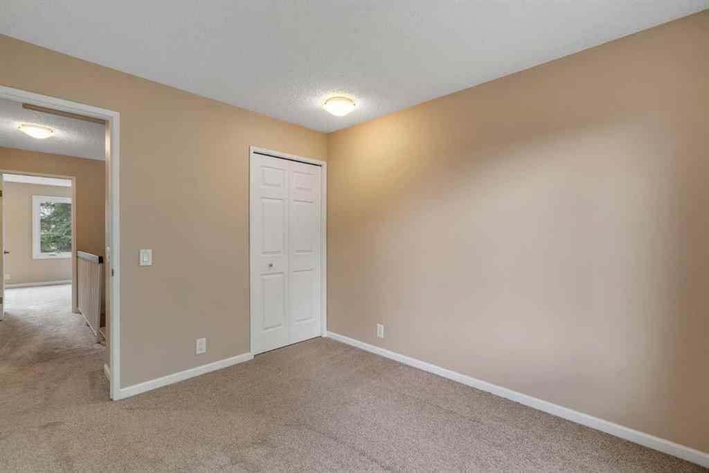 MLS® A2249410 - 22 Coachway Green SW in Coach Hill Calgary, Residential