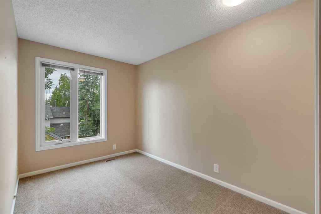 MLS® A2249410 - 22 Coachway Green SW in Coach Hill Calgary, Residential