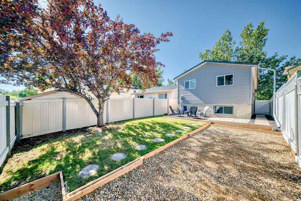 MLS® A2249467 - 102 Sunbank Way SE in Sundance Calgary, Residential