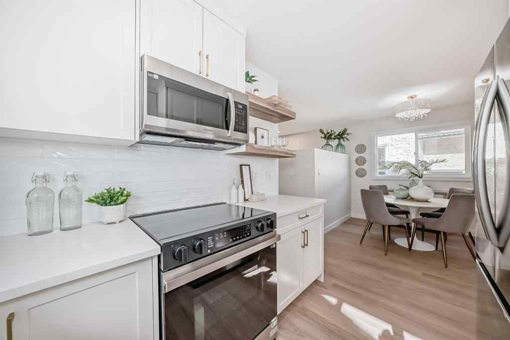 MLS® A2249467 - 102 Sunbank Way SE in Sundance Calgary, Residential