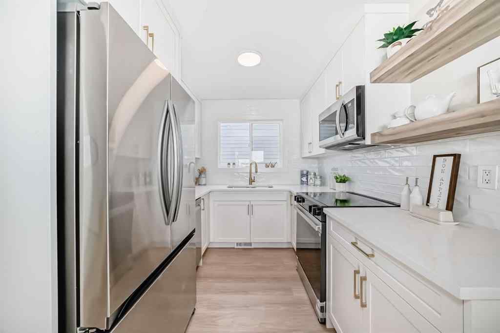 MLS® A2249467 - 102 Sunbank Way SE in Sundance Calgary, Residential