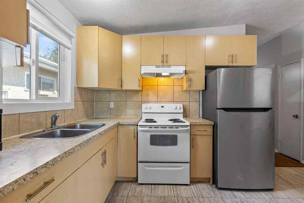 MLS® A2249479 - 5908 Trelle Drive NE in Thorncliffe Calgary, Residential