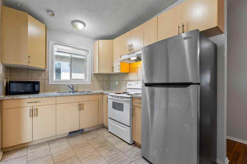 MLS® A2249479 - 5908 Trelle Drive NE in Thorncliffe Calgary, Residential