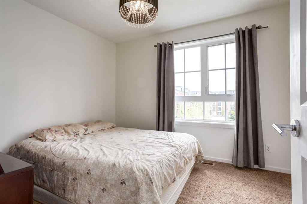 MLS® A2249502 - 215 Copperpond Common SE in Copperfield Calgary, Residential