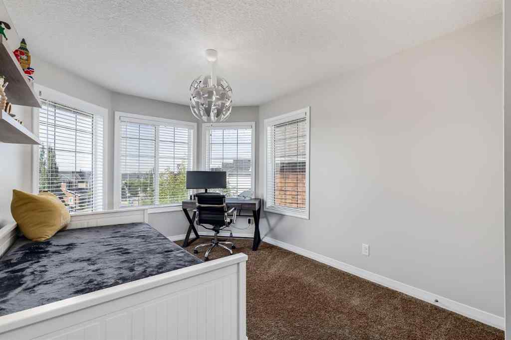MLS® A2249515 - 49 Auburn Springs Place SE in Auburn Bay Calgary, Residential